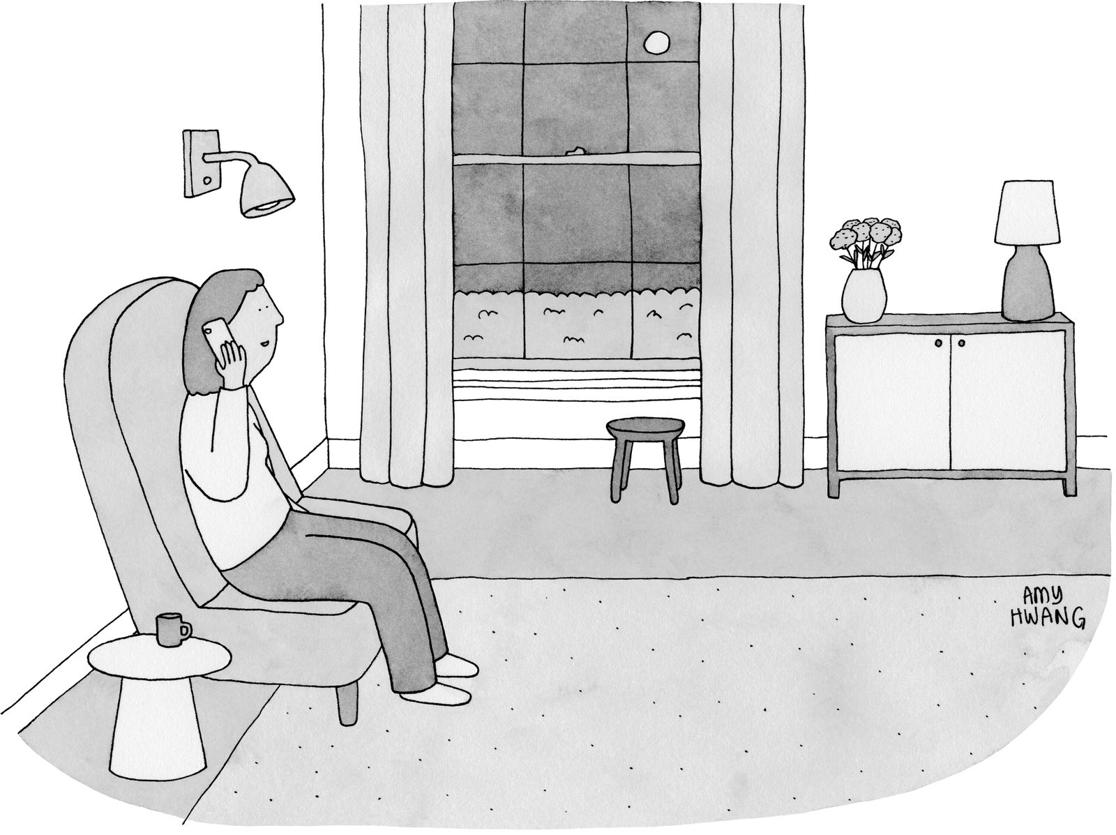 Woman talking on phone at home.